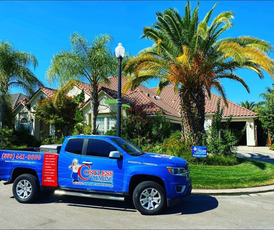 Costless Plumbing branded truck in a Fresno neighborhood