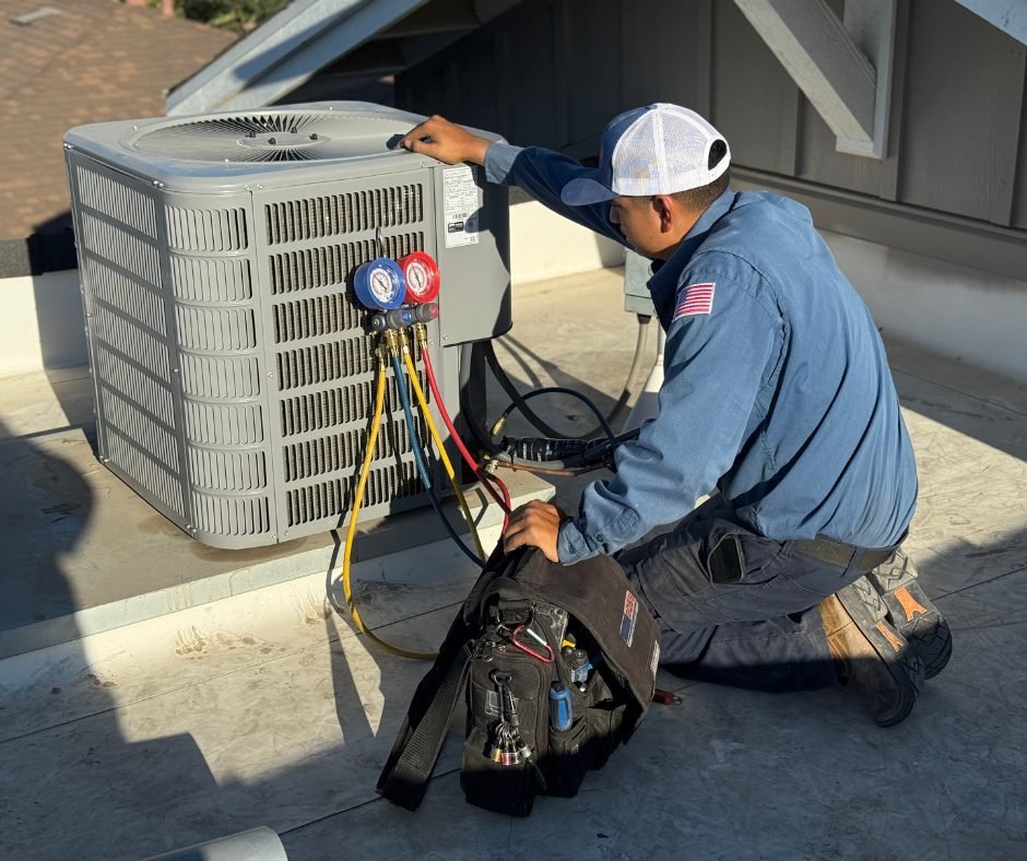 HVAC technician servicing an air conditioner