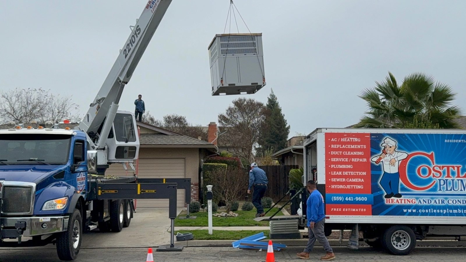 Costless technician performing a furnace tune-up in Fresno